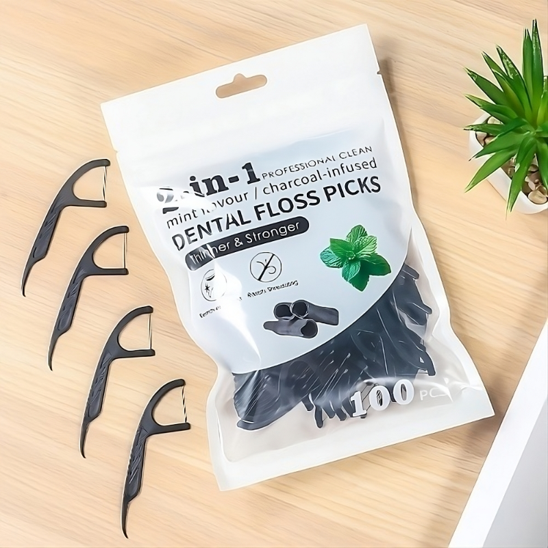 Fil dentaire au charbon de bambou et a la menthe